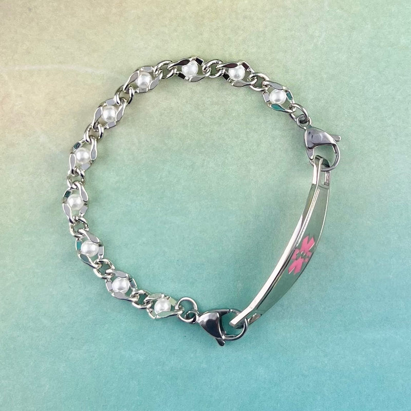 Silver and pearl chain medical alert bracelet.
