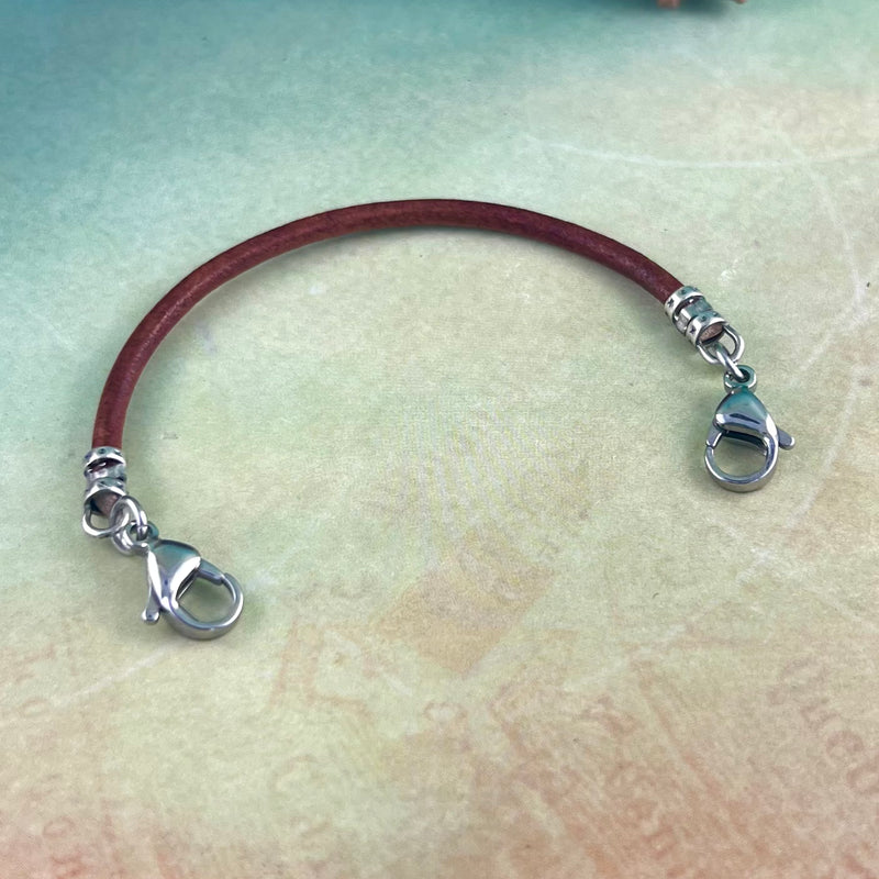 Replacement medical alert bracelet in brown leather with stainless steel lobster clasps.