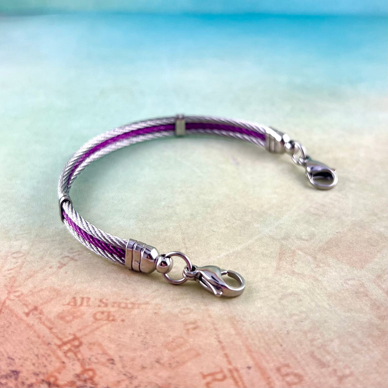 Purple and stainless steel cable replacement medical alert bracelet.