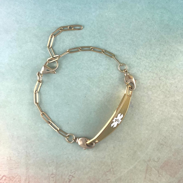Gold paperclip chain medical alert bracelet adjustable.