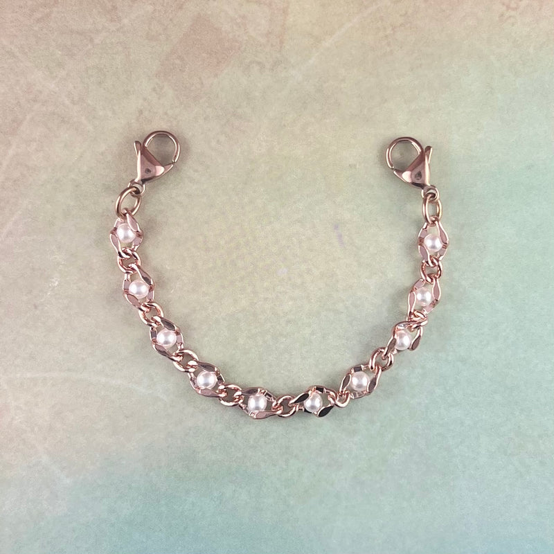 Pearl and rose gold replacement medical alert bracelet.