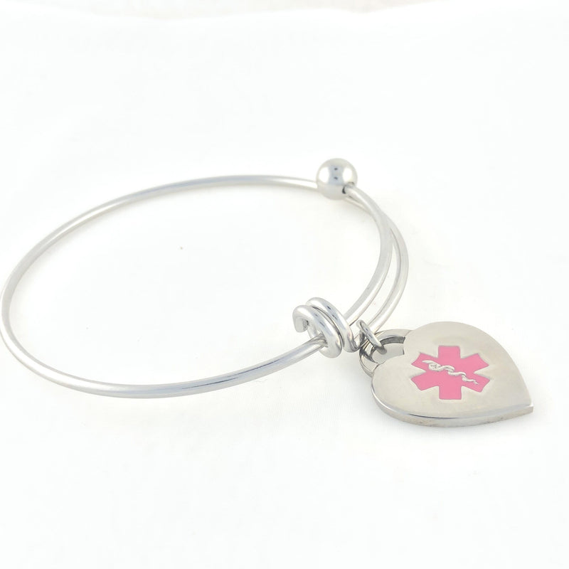 Stainless Steel Bangle and heart medical charm with pink star of life symbol.
