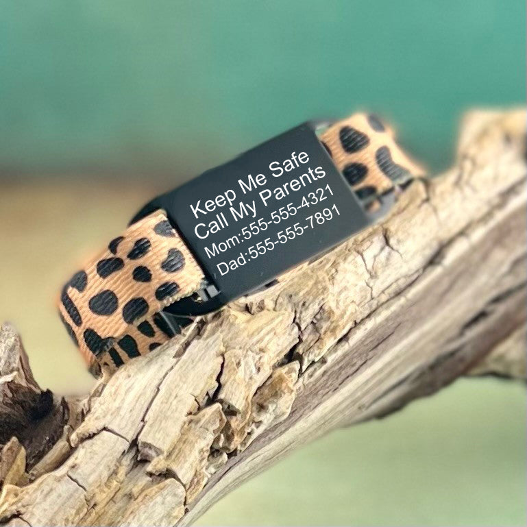 Cheetah print nylon identification bracelet with black custom engraved ID tag.