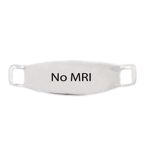 Back side of stainless steel medical alert tag with example of no MRI engraving.
