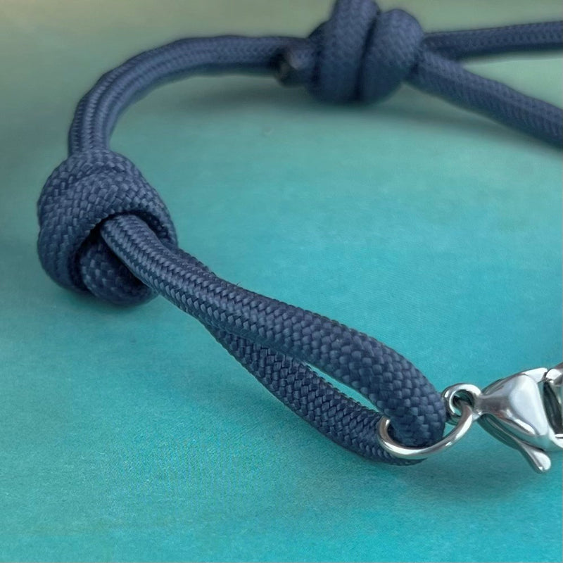 Blue paracord knot bracelet.