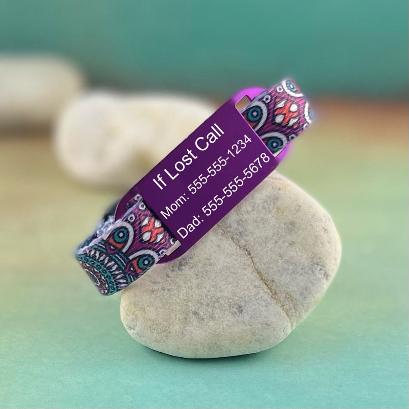 Purple and pink Aztec print medical band with purple engraved ID tag.