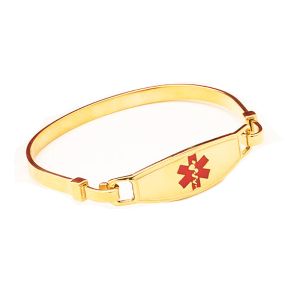 Gold plated bangle medical alert bracelet with red caduceus symbol.