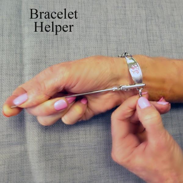 Bracelet helper used to help take bracelets on and off.
